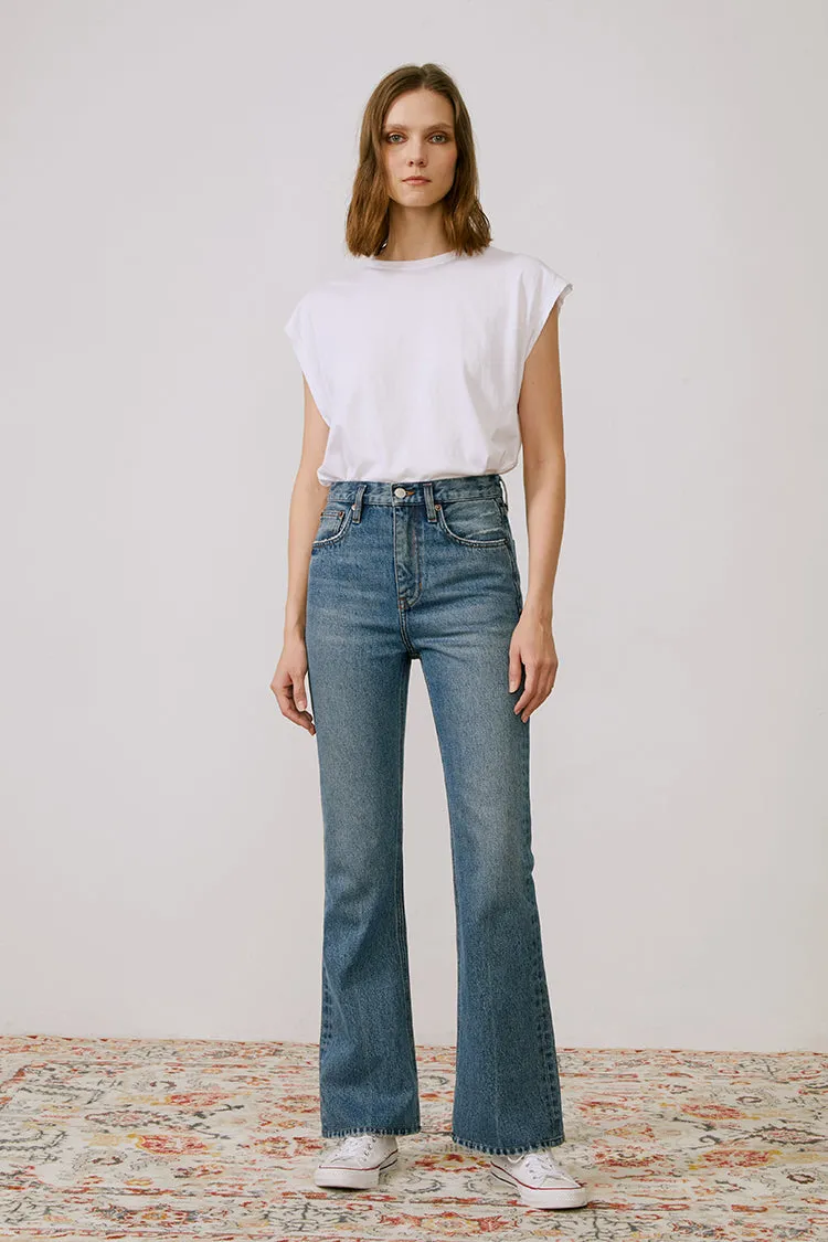 The French Song Mid Rise Bootcut Jeans sold by Etela Petite