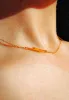 Lucent Arc Necklace sold by Seek Discomfort