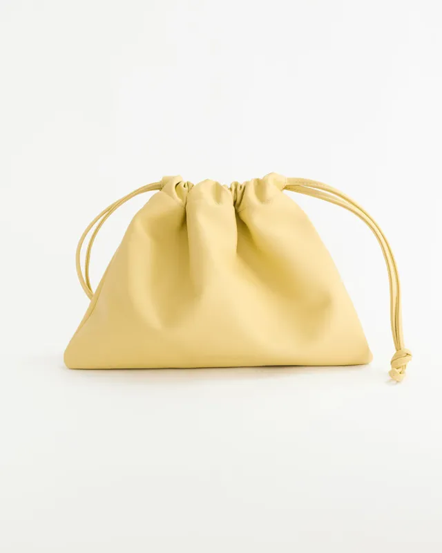 Fin Drawstring Bag: Butter Yellow made by The Horse