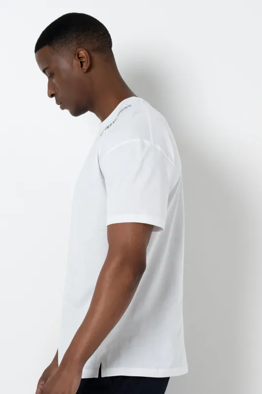 Oversized Slit Hem T-Shirt sold by Refinery