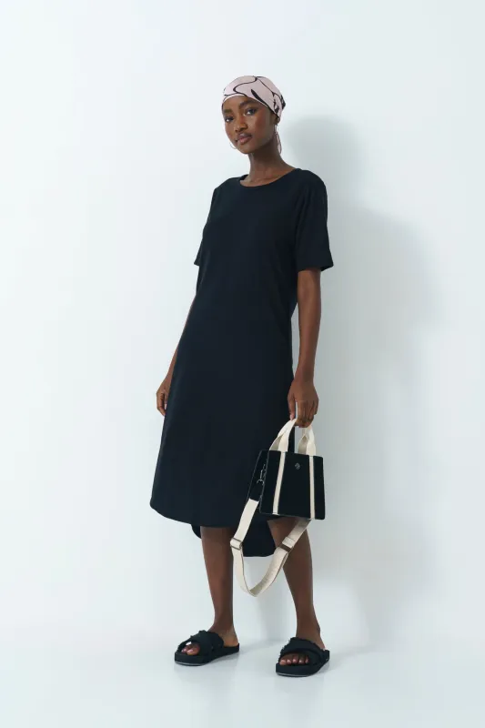 Scoop Hem Dress sold by Refinery