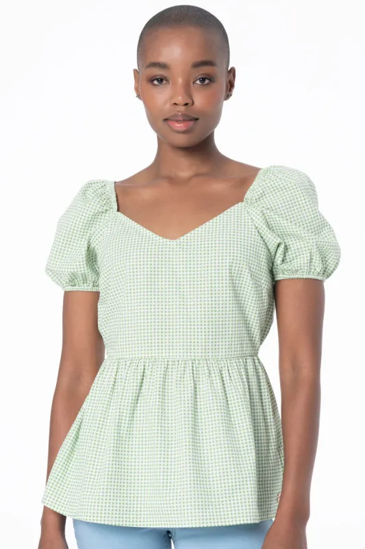 Peplum Top sold by Refinery