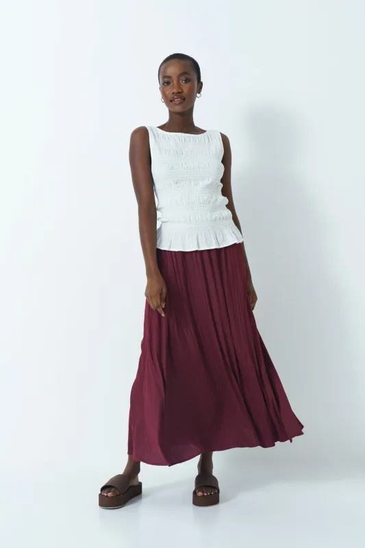 Pleated Skirt sold by Refinery