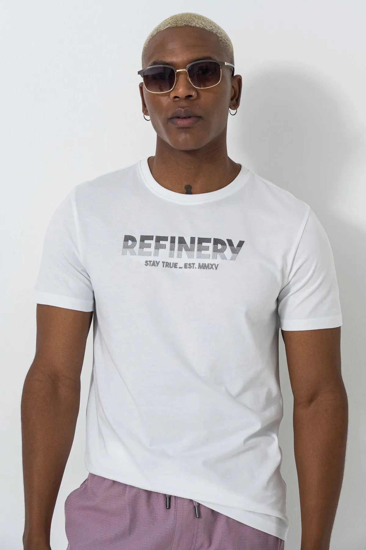Branded T-Shirt sold by Refinery