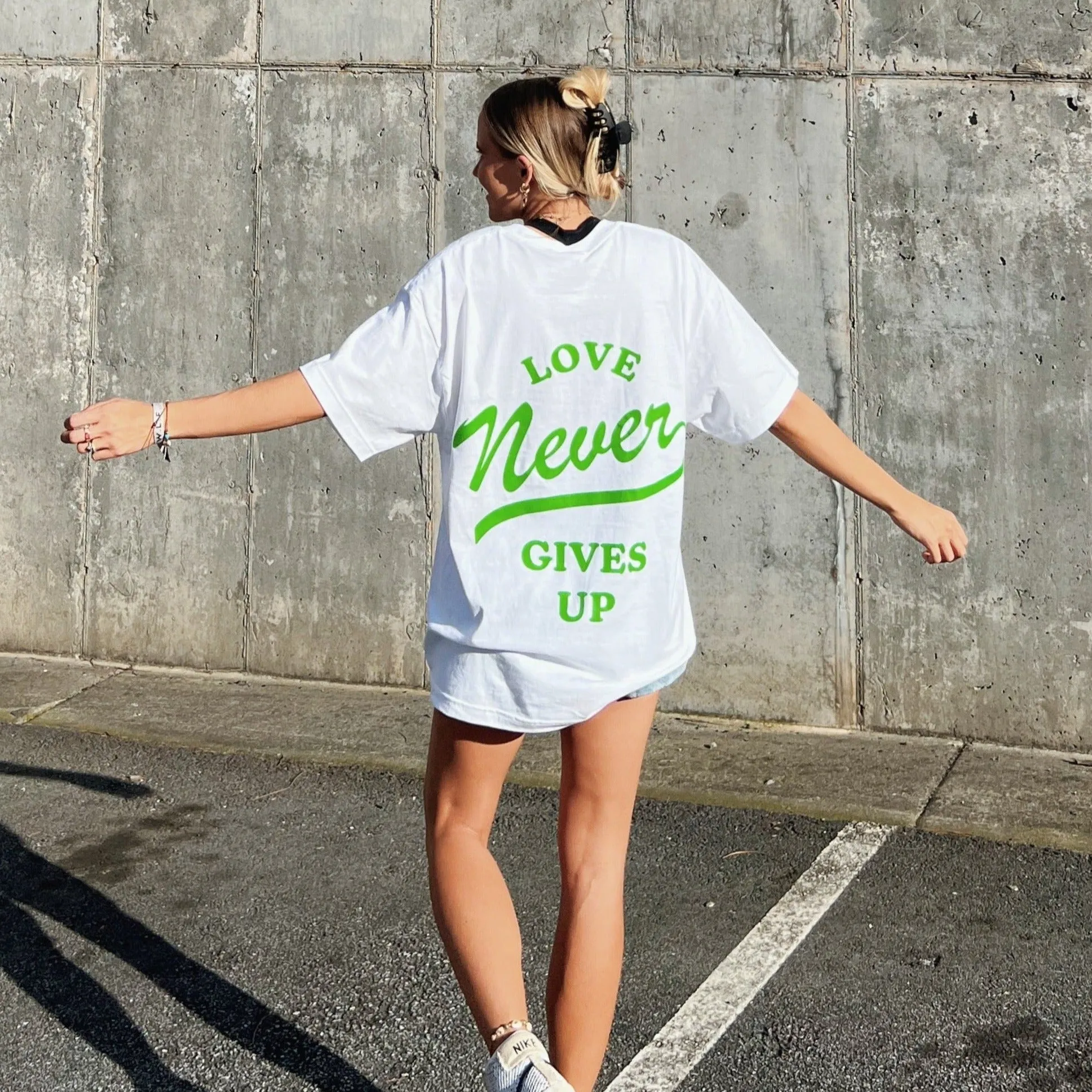 RESTOCK! | "LOVE NEVER GIVES UP" TEE | WHITE sold by He Would Love First
