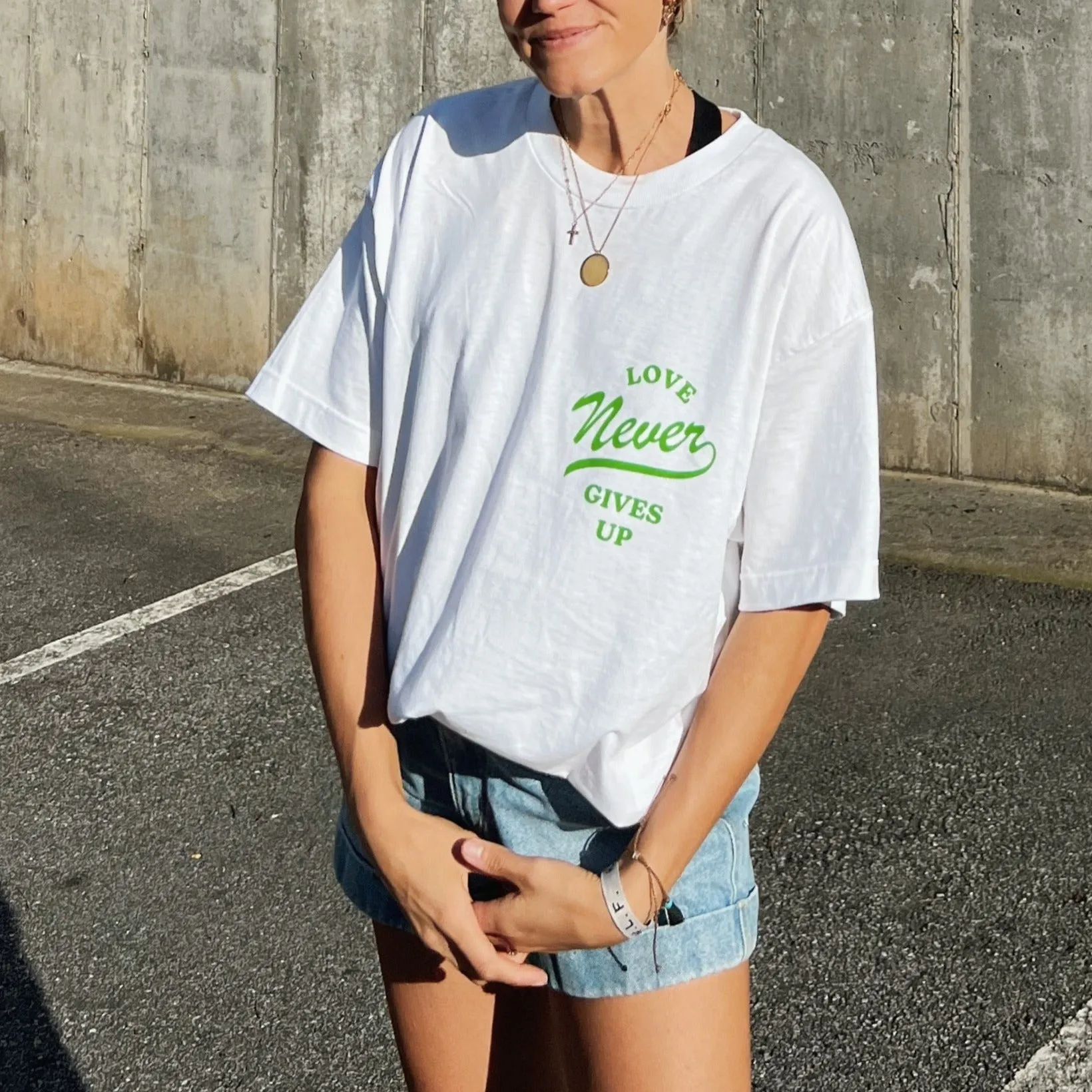 RESTOCK! | "LOVE NEVER GIVES UP" TEE | WHITE sold by He Would Love First product image thumbnail 5