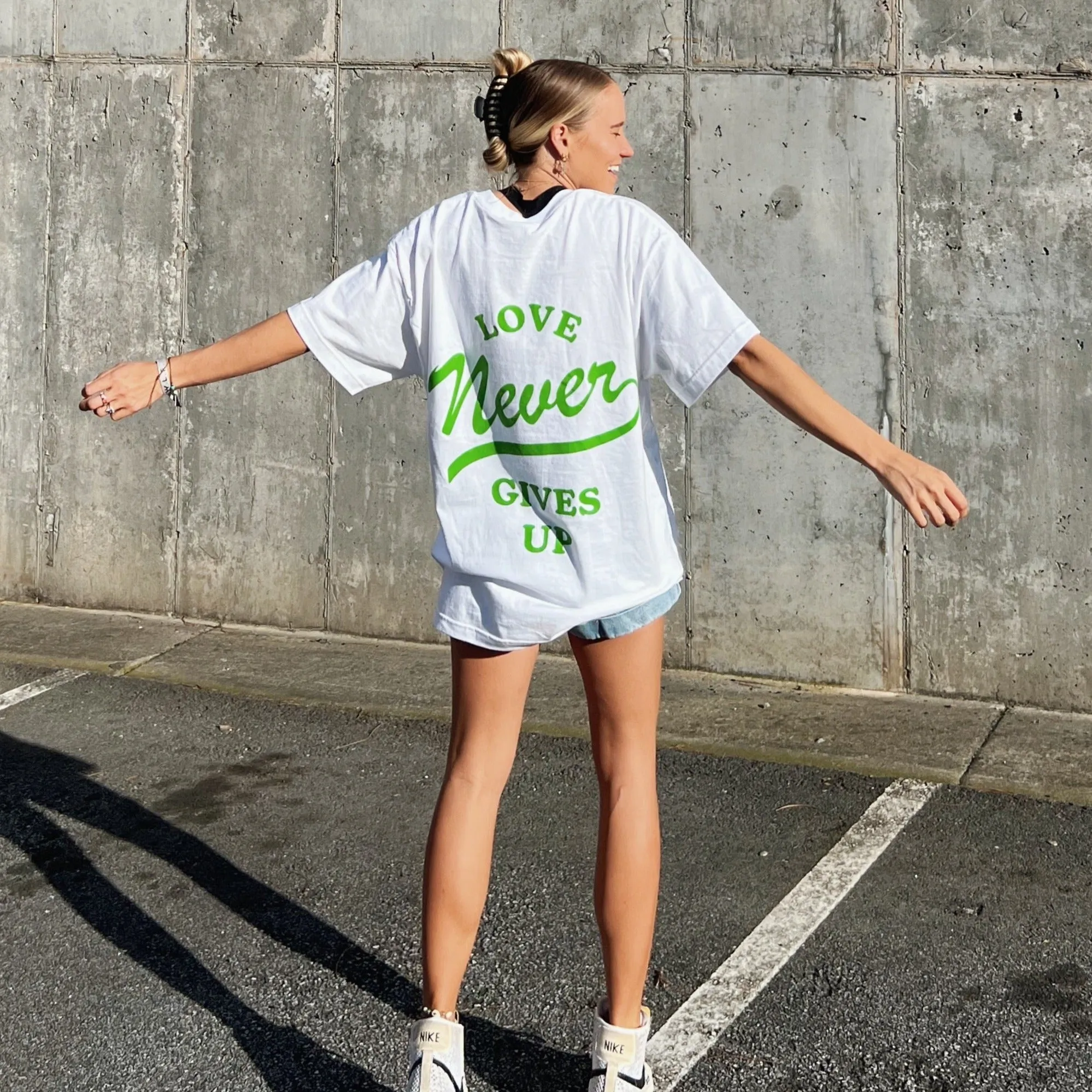 RESTOCK! | "LOVE NEVER GIVES UP" TEE | WHITE sold by He Would Love First product image thumbnail 4