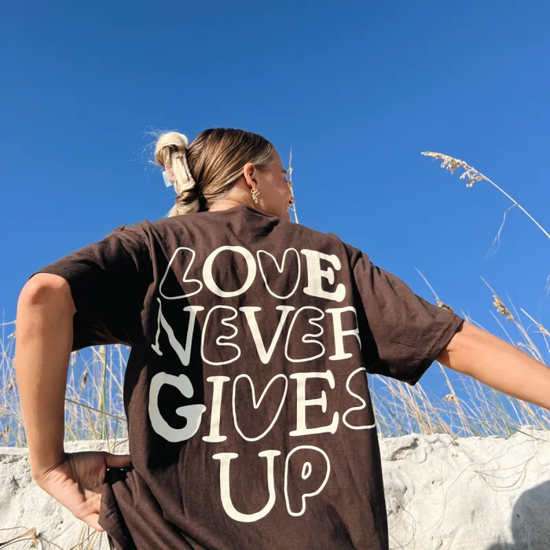 NEW! | "LOVE NEVER GIVES UP" TEE | CHOCOLATE sold by He Would Love First