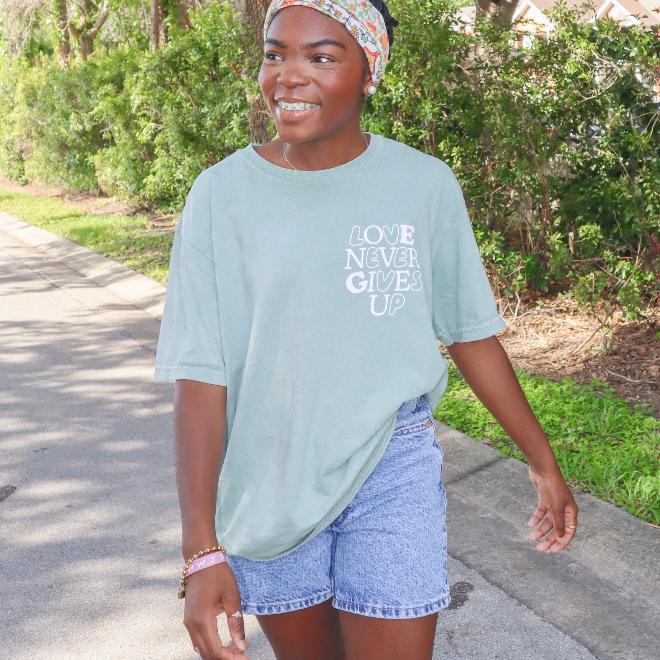 NEW! | "LOVE NEVER GIVES UP" PREMIUM COMFORT COLOR TEE | BAY sold by He Would Love First product image thumbnail 5