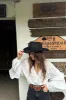 Chrissy White Ruffle Blouse sold by 12th Tribe