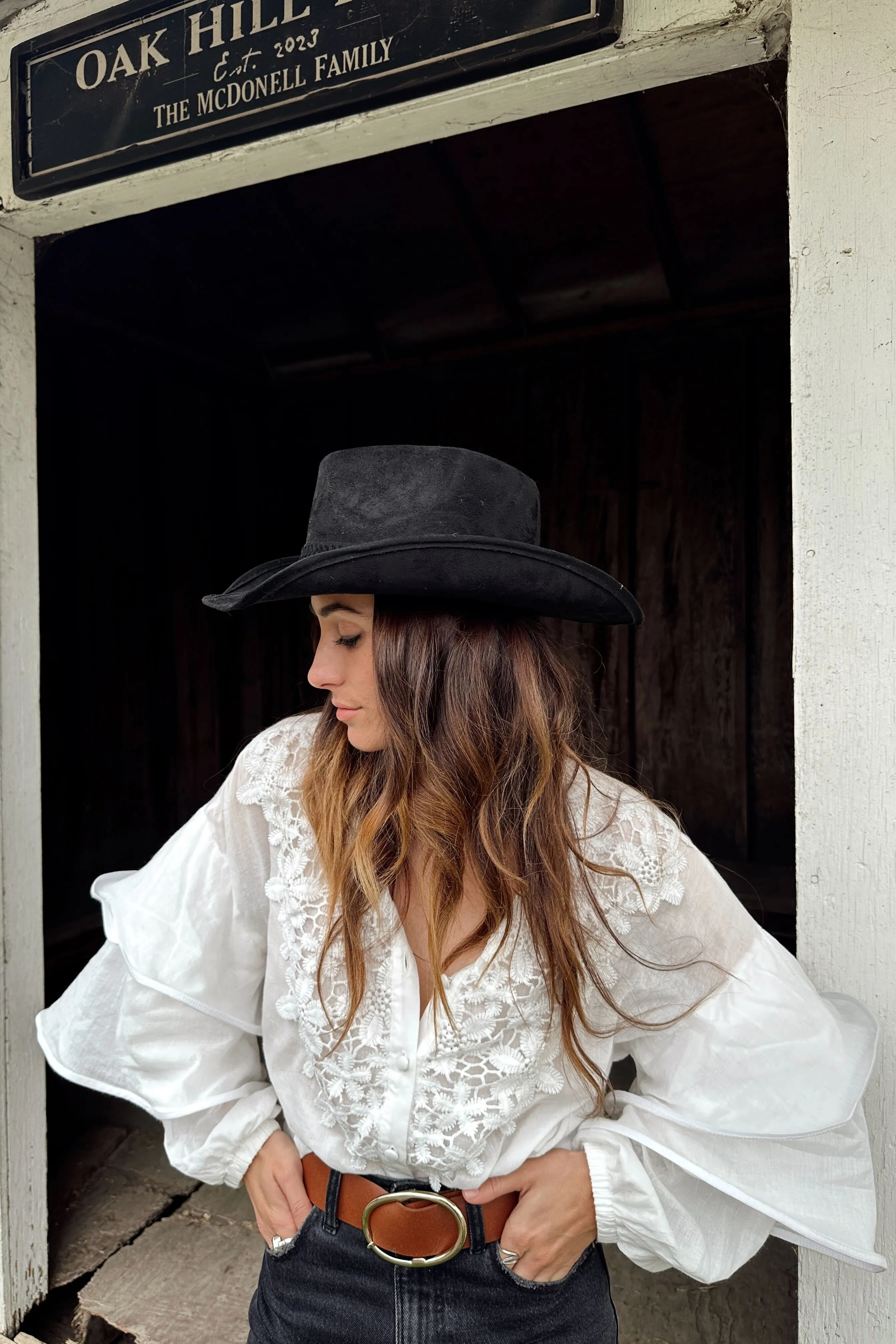Chrissy White Ruffle Blouse sold by 12th Tribe