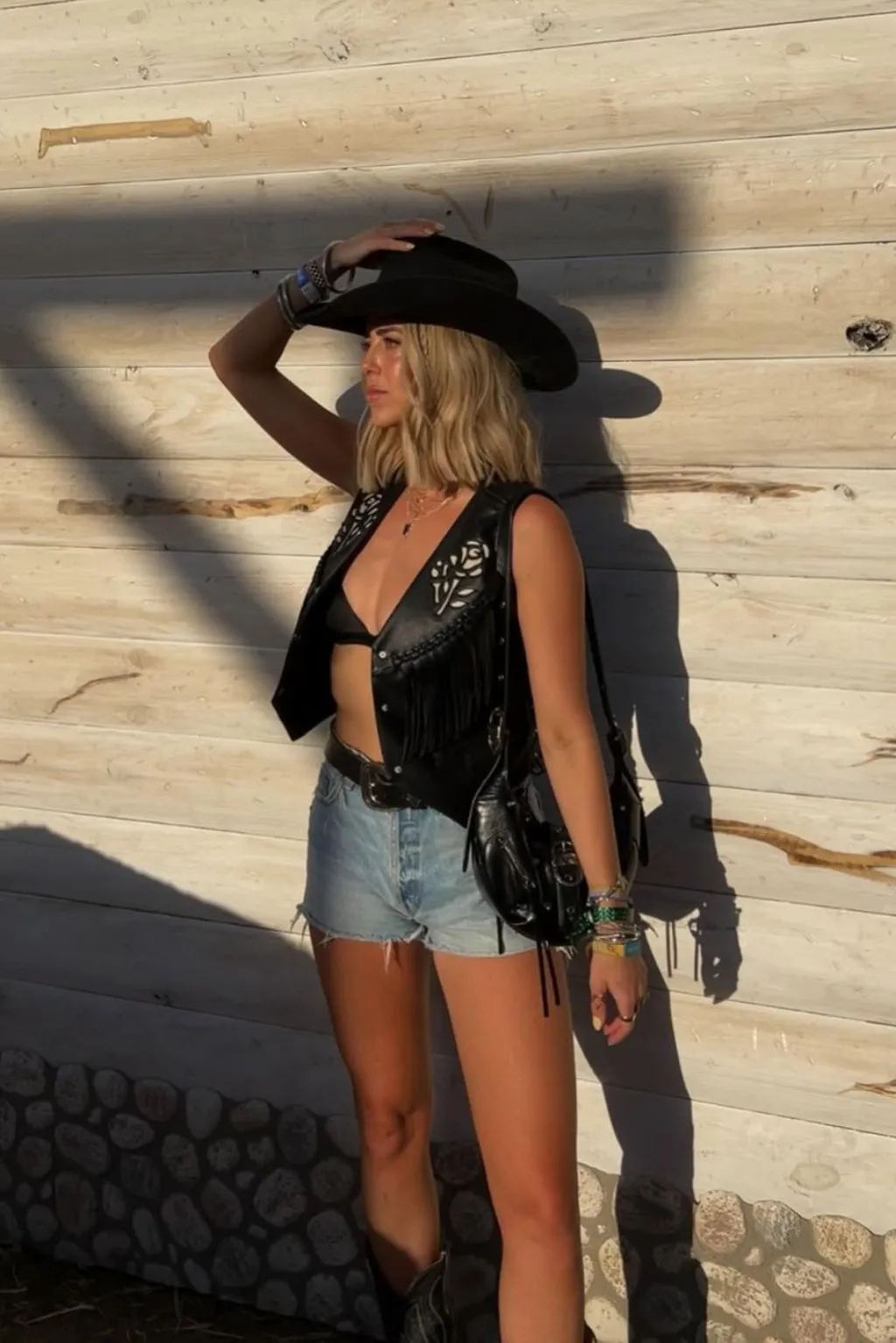 Lennon Black Faux Leather Fringe Vest sold by 12th Tribe