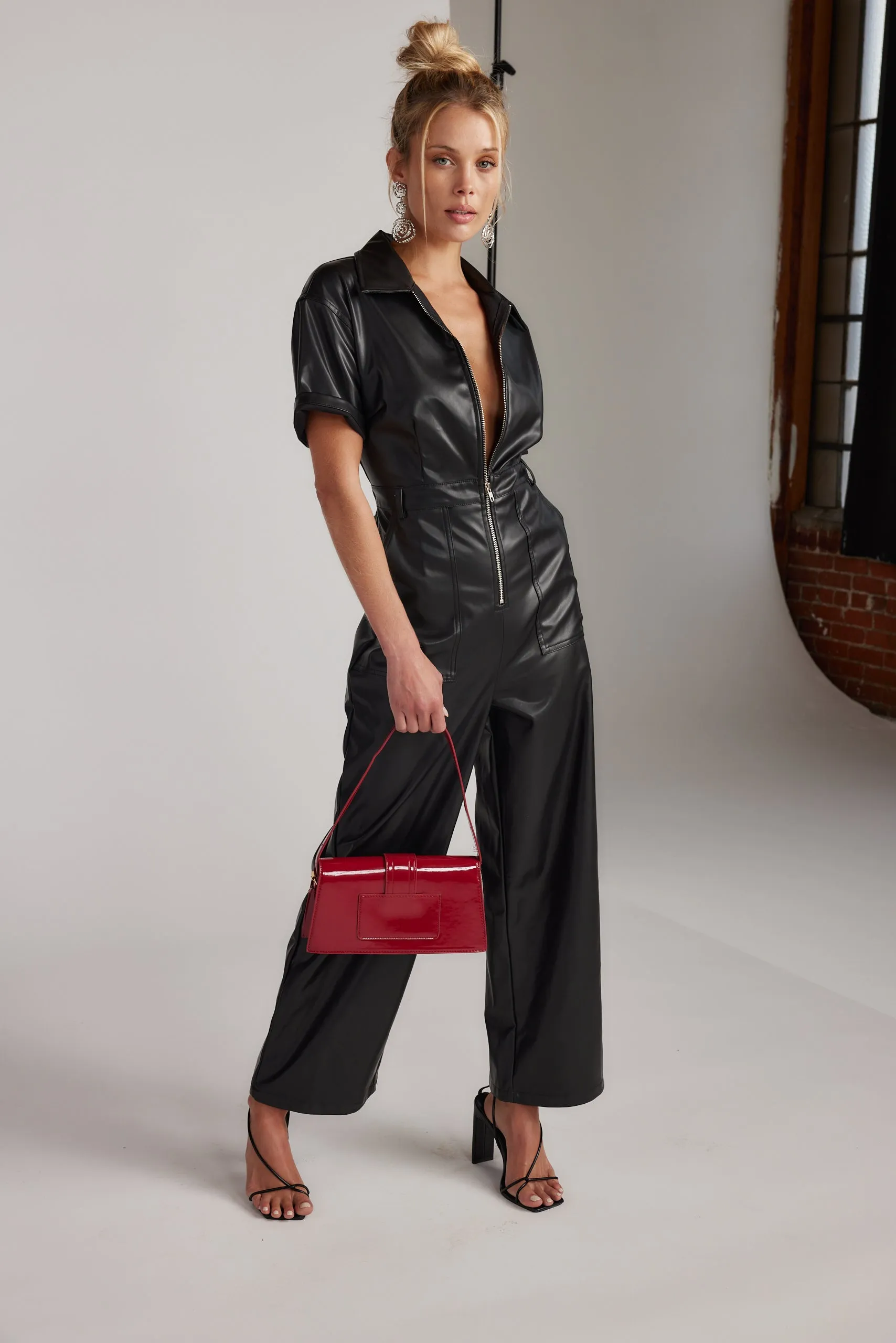 Erika Black Leather Jumpsuit sold by 12th Tribe