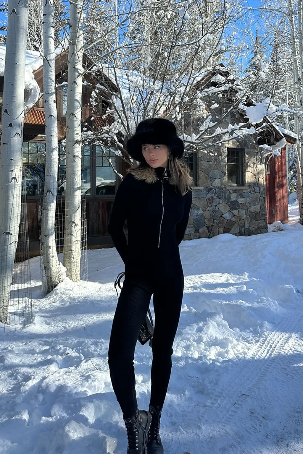 Apres Faux Fur Trimmed Black Ribbed Knit Jumpsuit sold by 12th Tribe product image thumbnail 4