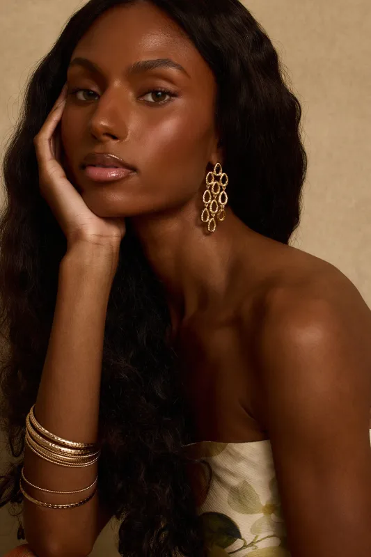 Paula Gold Statement Earrings made by 12th Tribe