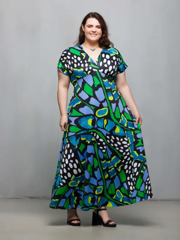 24seven Comfort Apparel Plus Size Blue Butterfly Print V Neck Empire Waist Cap Sleeve Maxi Dress sold by 24/7 Comfort Apparel