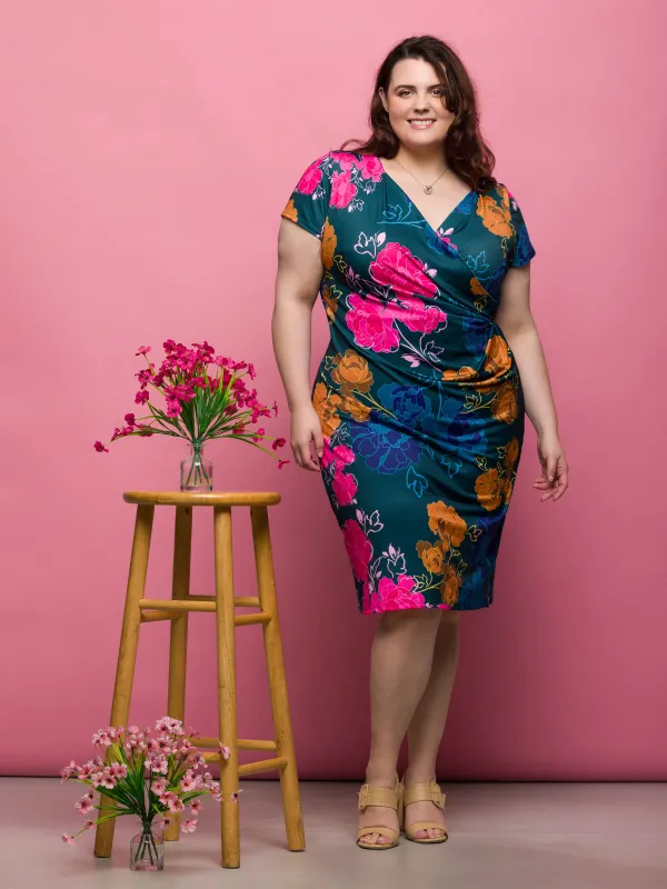 24seven Comfort Apparel Plus Size Blue Floral Knee Length Short Sleeve Faux Wrap Dress sold by 24/7 Comfort Apparel
