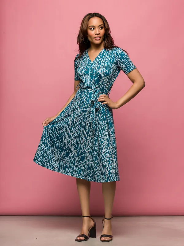 24seven Comfort Apparel Womens Teal Print Short Sleeve Tie Waist Midi Dress sold by 24/7 Comfort Apparel