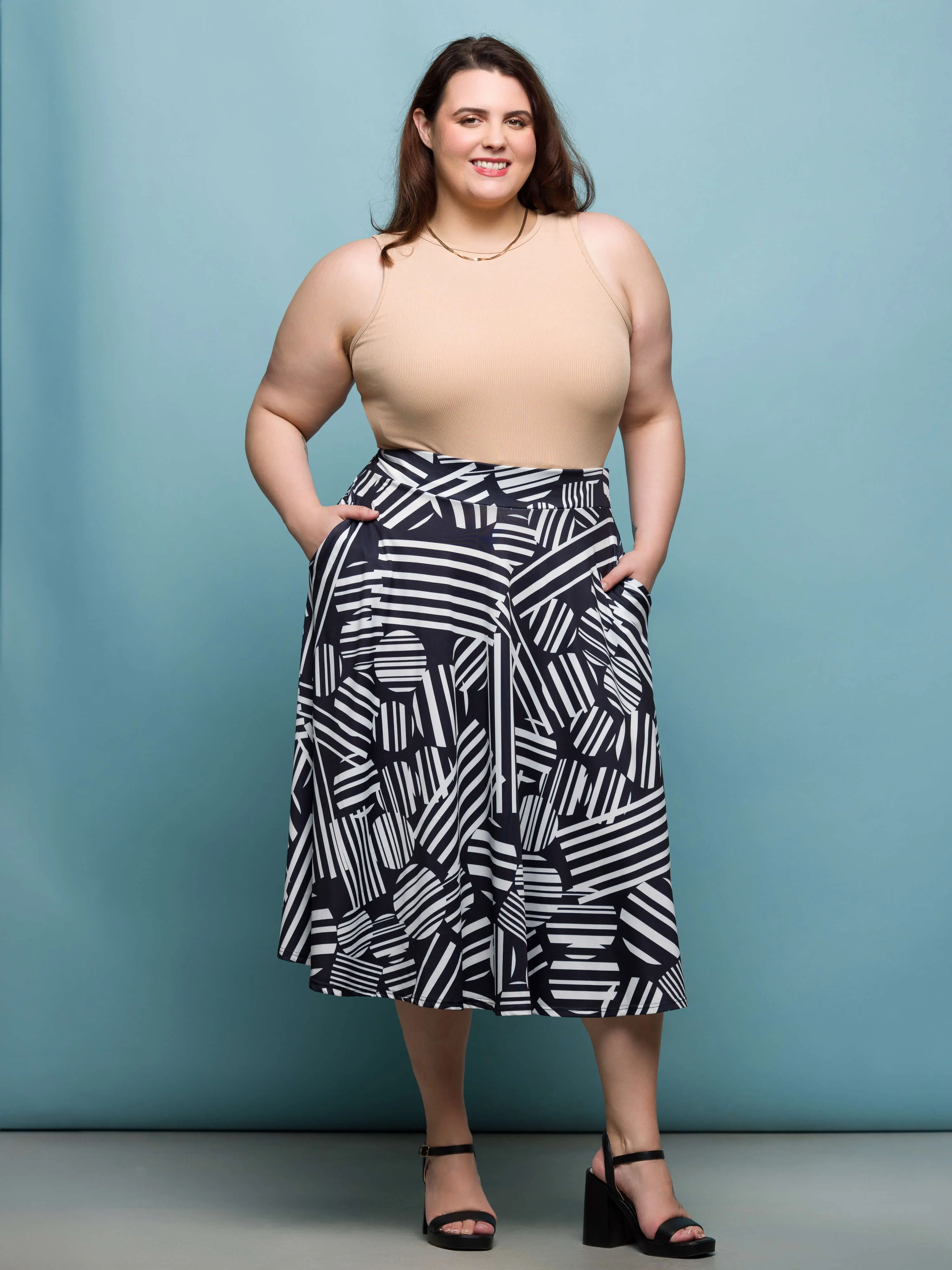 24seven Comfort Apparel Plus Size Black Geometric Print Elastic Waist Pocket Midi Skirt sold by 24/7 Comfort Apparel product image thumbnail 2