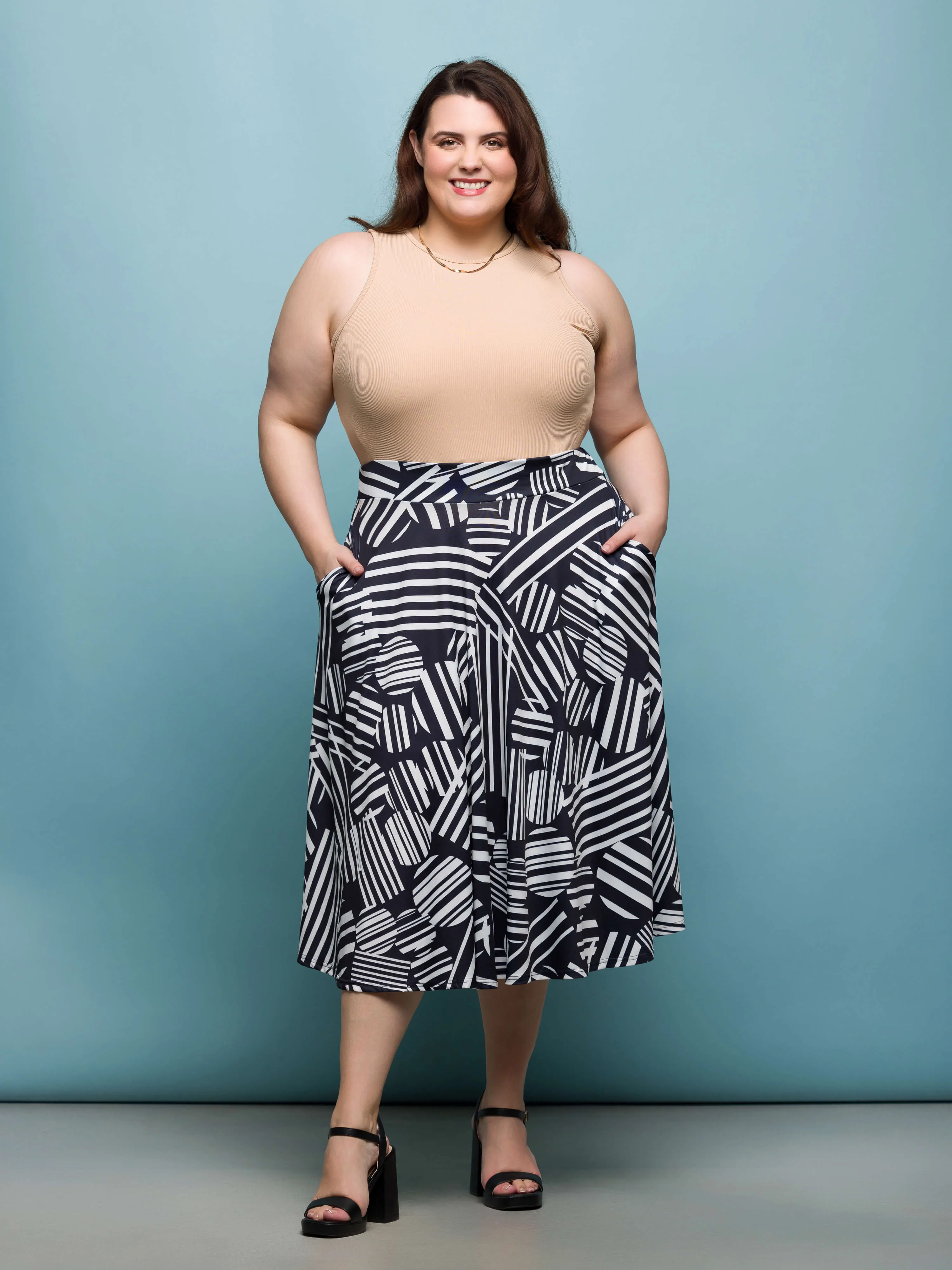 24seven Comfort Apparel Plus Size Black Geometric Print Elastic Waist Pocket Midi Skirt sold by 24/7 Comfort Apparel