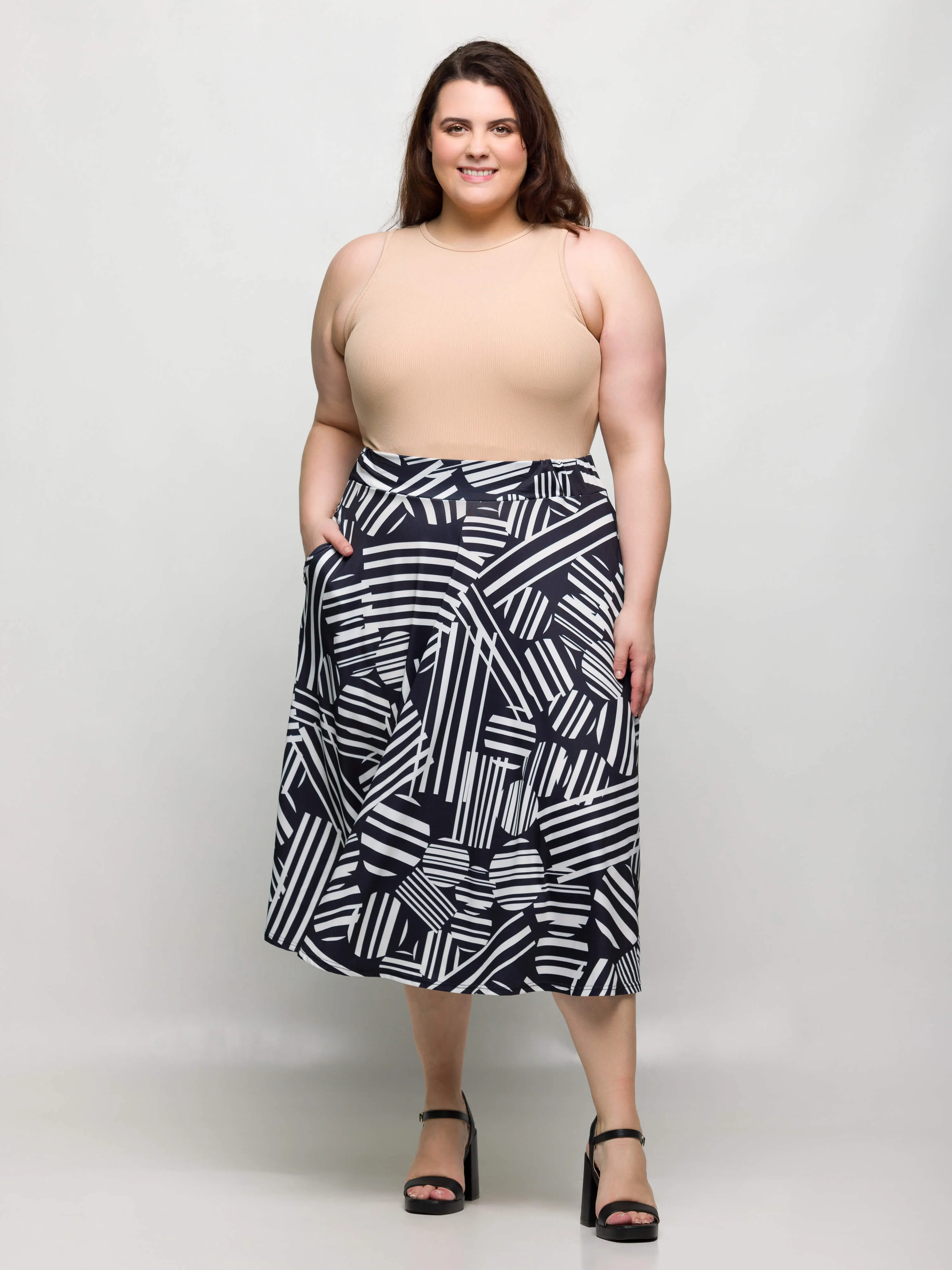 24seven Comfort Apparel Plus Size Black Geometric Print Elastic Waist Pocket Midi Skirt sold by 24/7 Comfort Apparel product image thumbnail 3