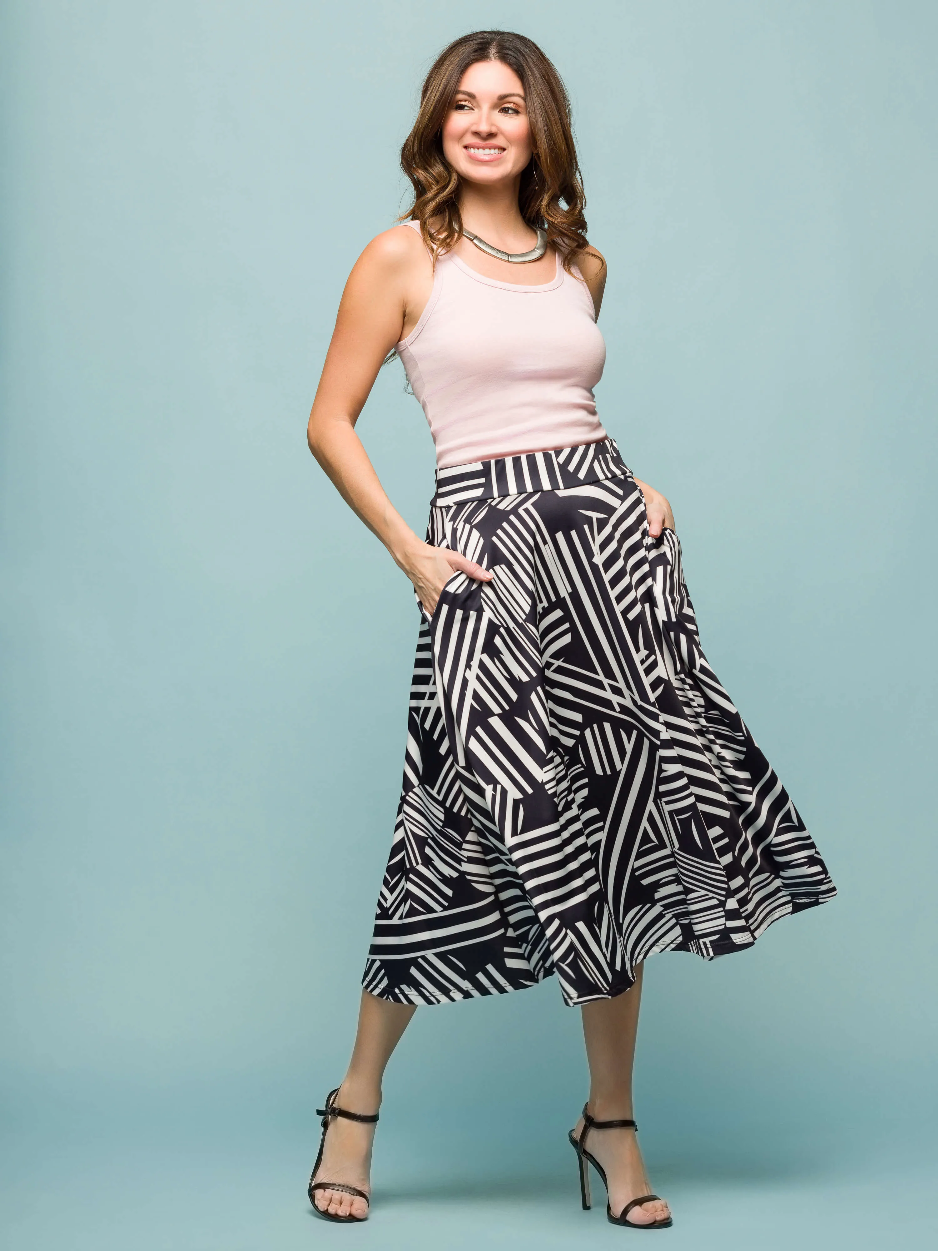 24seven Comfort Apparel Womens Black Geometric Print Elastic Waist Pocket Midi Skirt sold by 24/7 Comfort Apparel