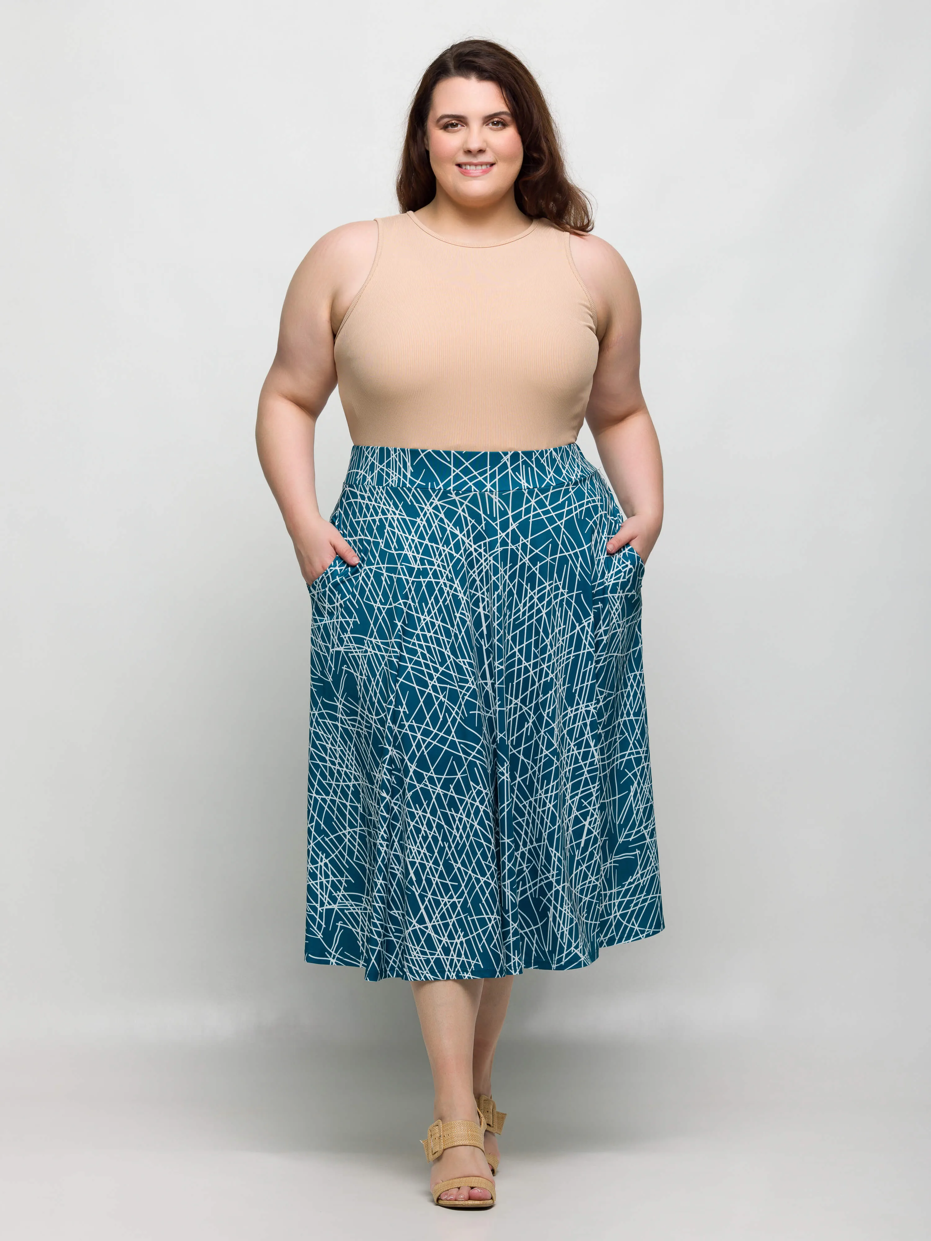 24seven Comfort Apparel Plus Size Teal Geometric Print Elastic Waist Pocket Midi Skirt sold by 24/7 Comfort Apparel product image thumbnail 3