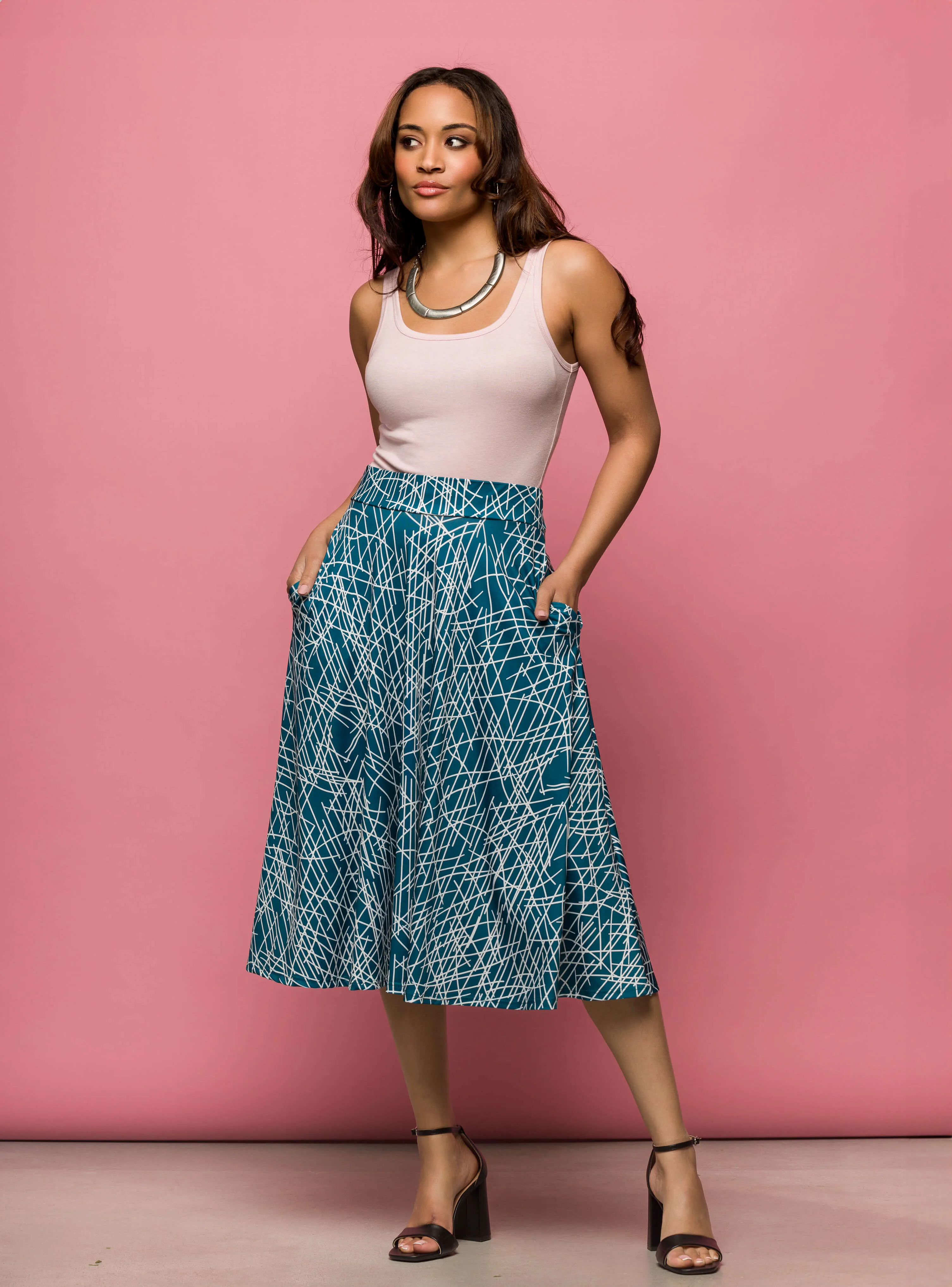 24seven Comfort Apparel Womens Teal Geometric Print Elastic Waist Pocket Midi Skirt sold by 24/7 Comfort Apparel