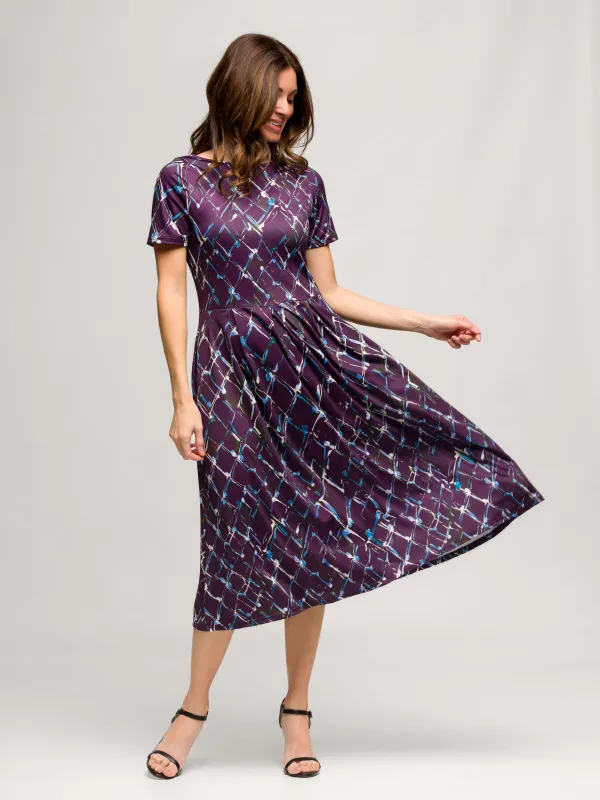 24seven Comfort Apparel Womens Purple Print Short Sleeve Pleated Flare Midi Pocket Dress sold by 24/7 Comfort Apparel