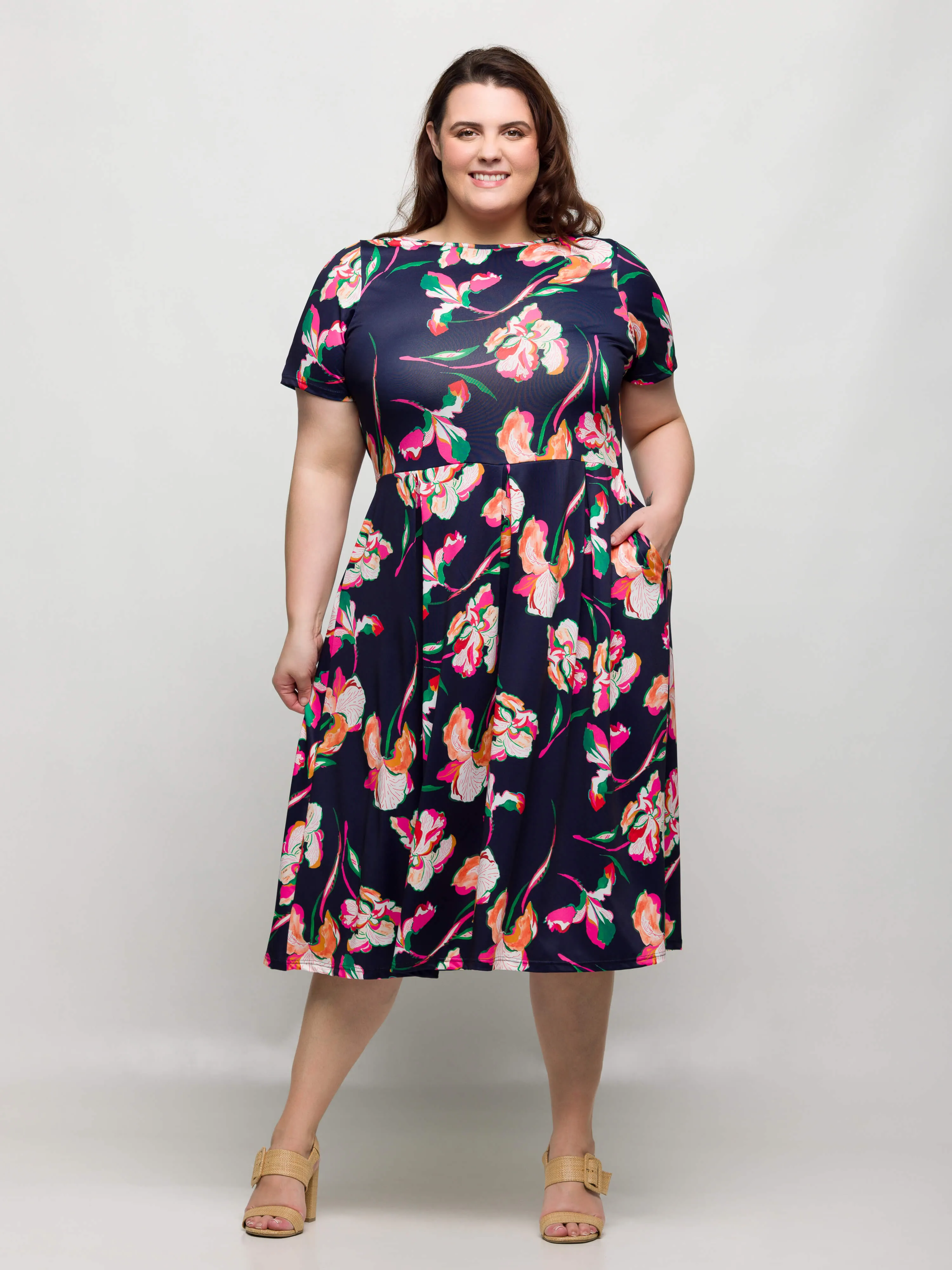 24seven Comfort Apparel Plus Size Navy Floral Short Sleeve Pleated Flare Midi Pocket Dress sold by 24/7 Comfort Apparel product image thumbnail 3