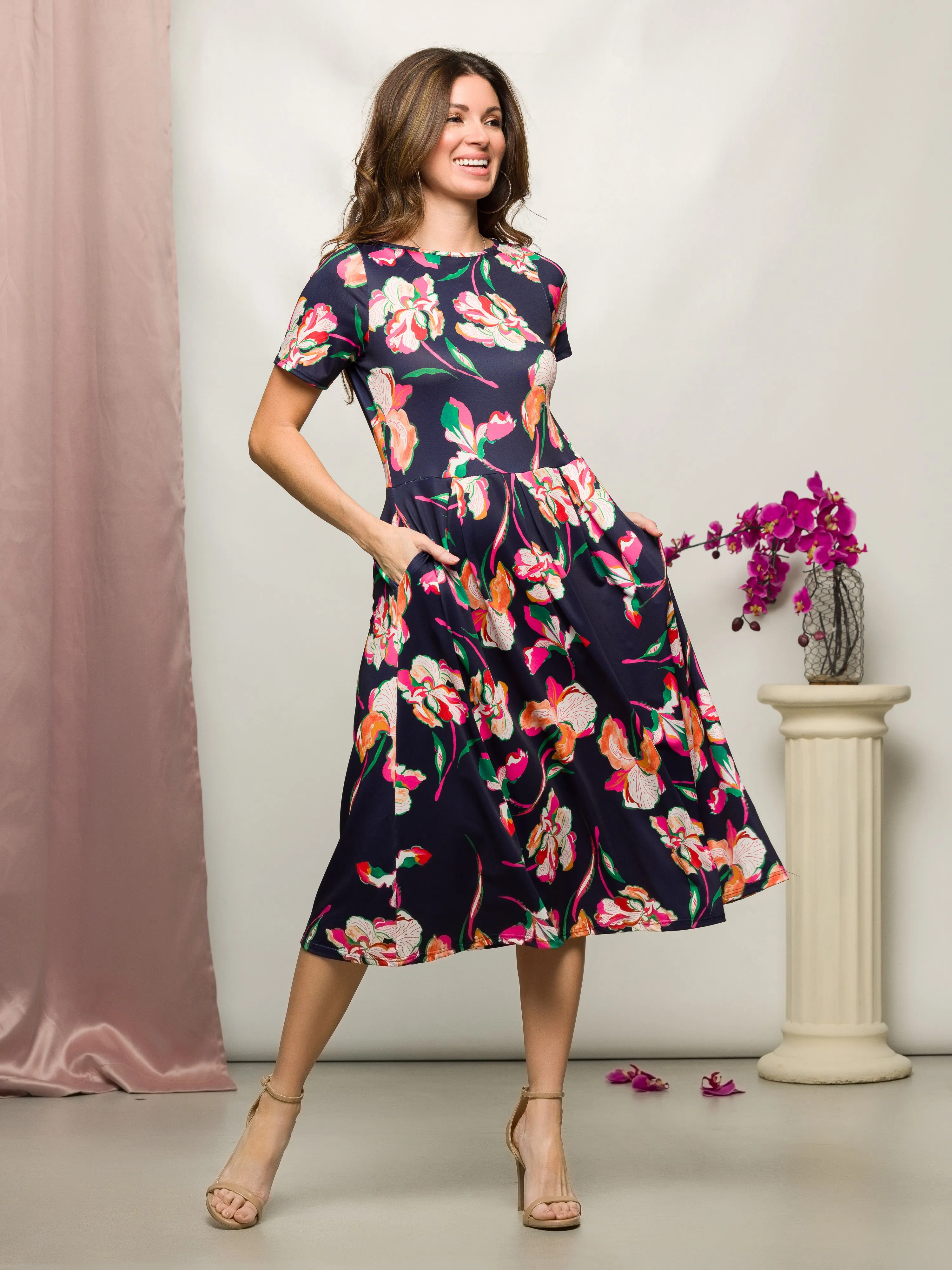 24seven Comfort Apparel Womens Navy Floral Short Sleeve Pleated Flare Midi Pocket Dress sold by 24/7 Comfort Apparel
