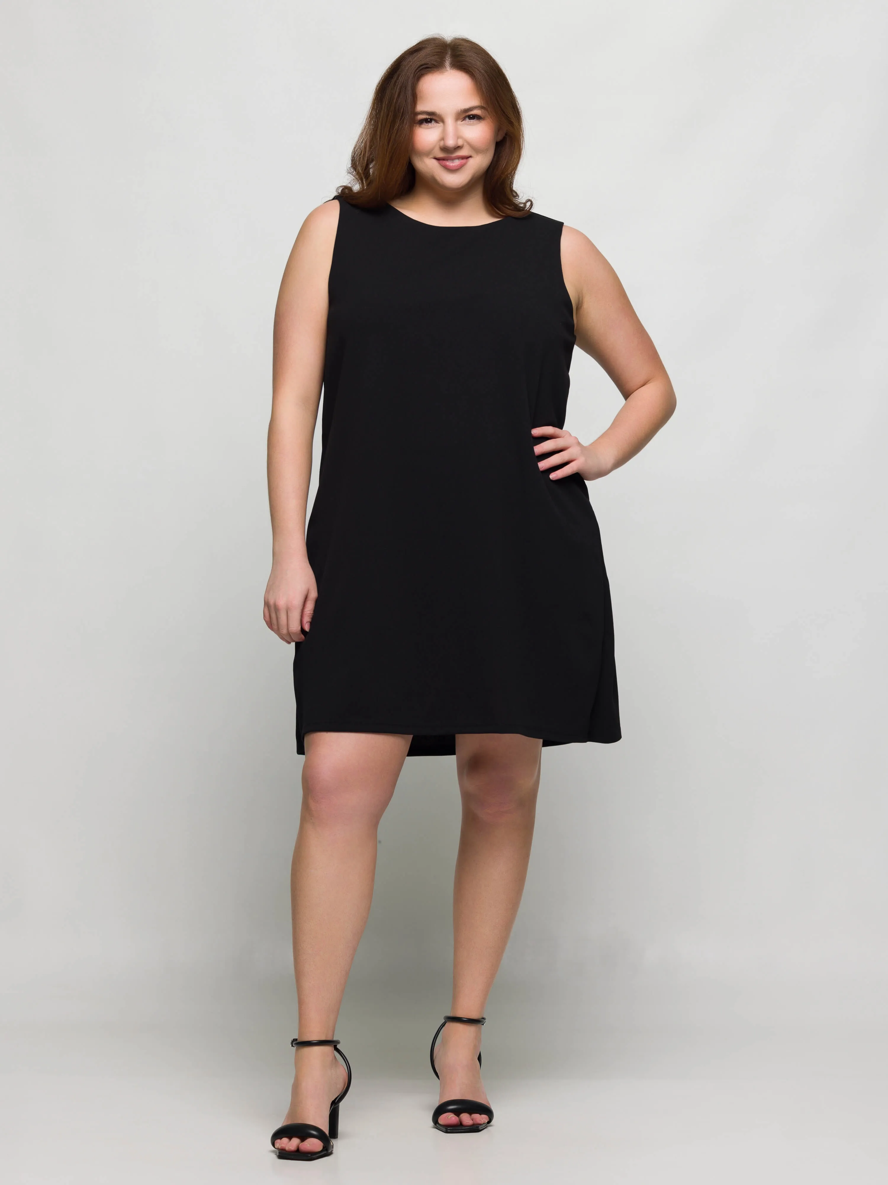 24seven Comfort Apparel Plus Size Solid Color Sleeveless Mini Shift Dress sold by 24/7 Comfort Apparel product image thumbnail 3