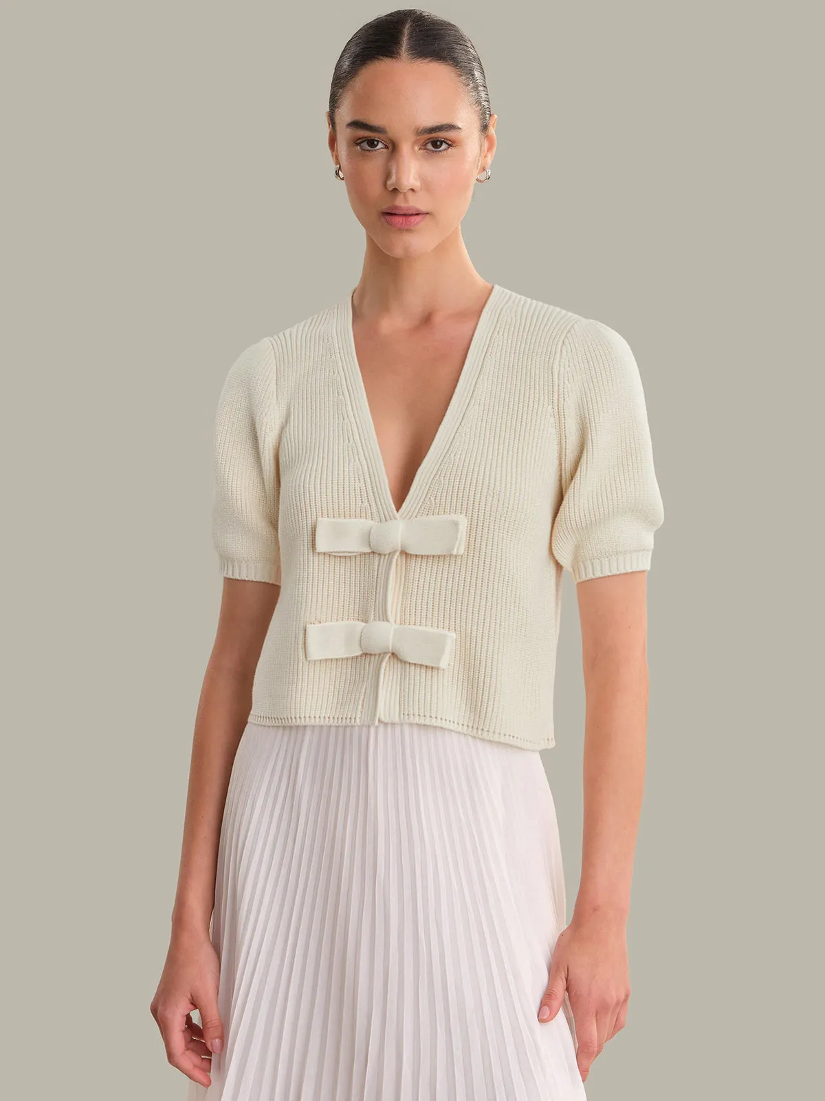 Elaine: Cotton Puff Sleeve Tie Front Top sold by 525 America