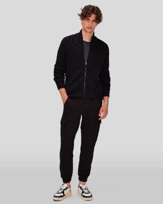 Travel Chino in Black sold by 7 For All Mankind