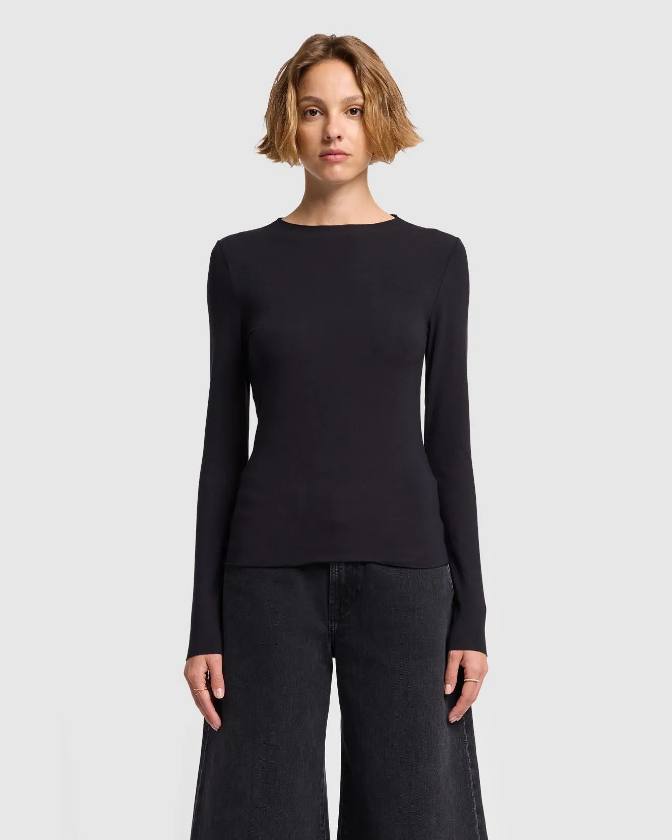 Long Sleeve High Neck Top in Black sold by 7 For All Mankind