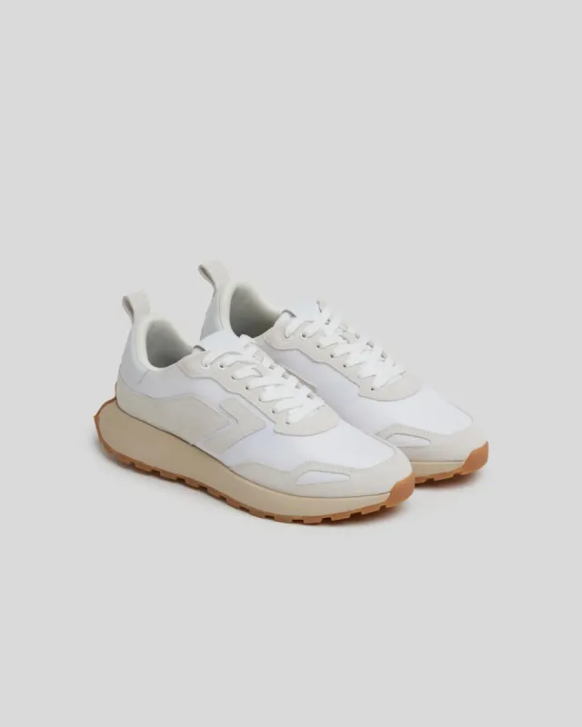 Running Sneaker in White sold by 7 For All Mankind