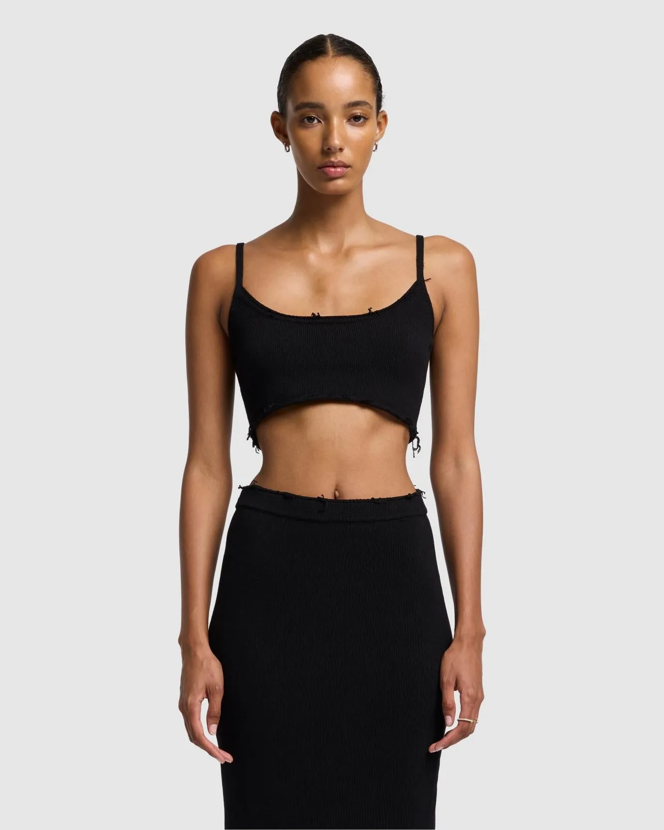 Distressed Knit Cropped Tank in Black sold by 7 For All Mankind