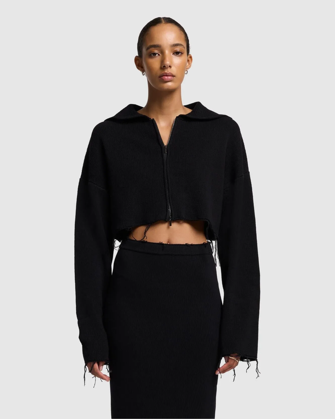 Distressed Knit Cropped Hoodie in Black sold by 7 For All Mankind