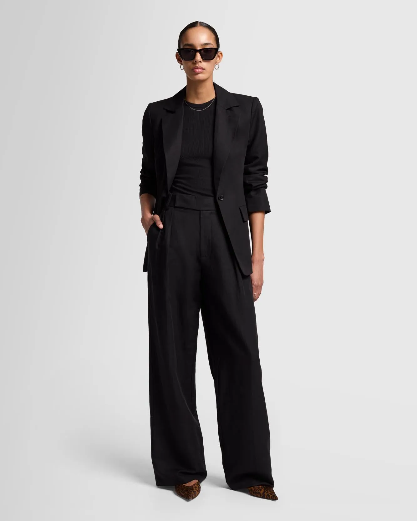 Linen Blend Pleated Trouser in Black sold by 7 For All Mankind