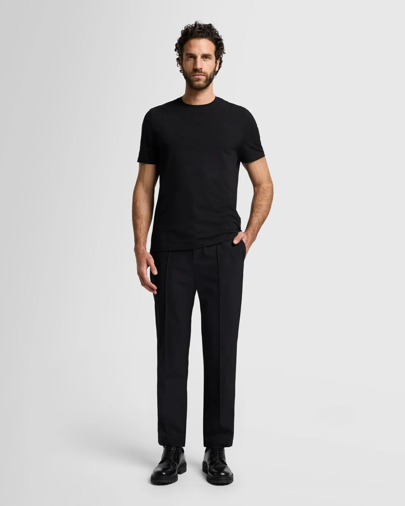 Dynamic Luxe Chino in Black sold by 7 For All Mankind
