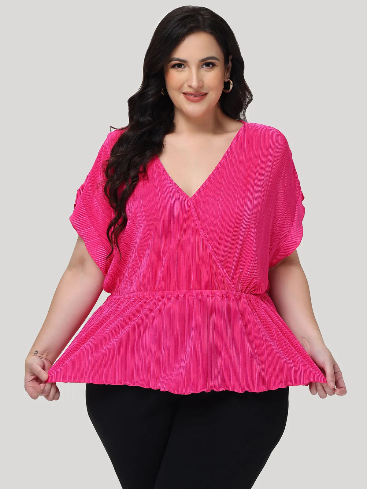 Plus Flutter Sleeve Wrap Top sold by 89th & Madison