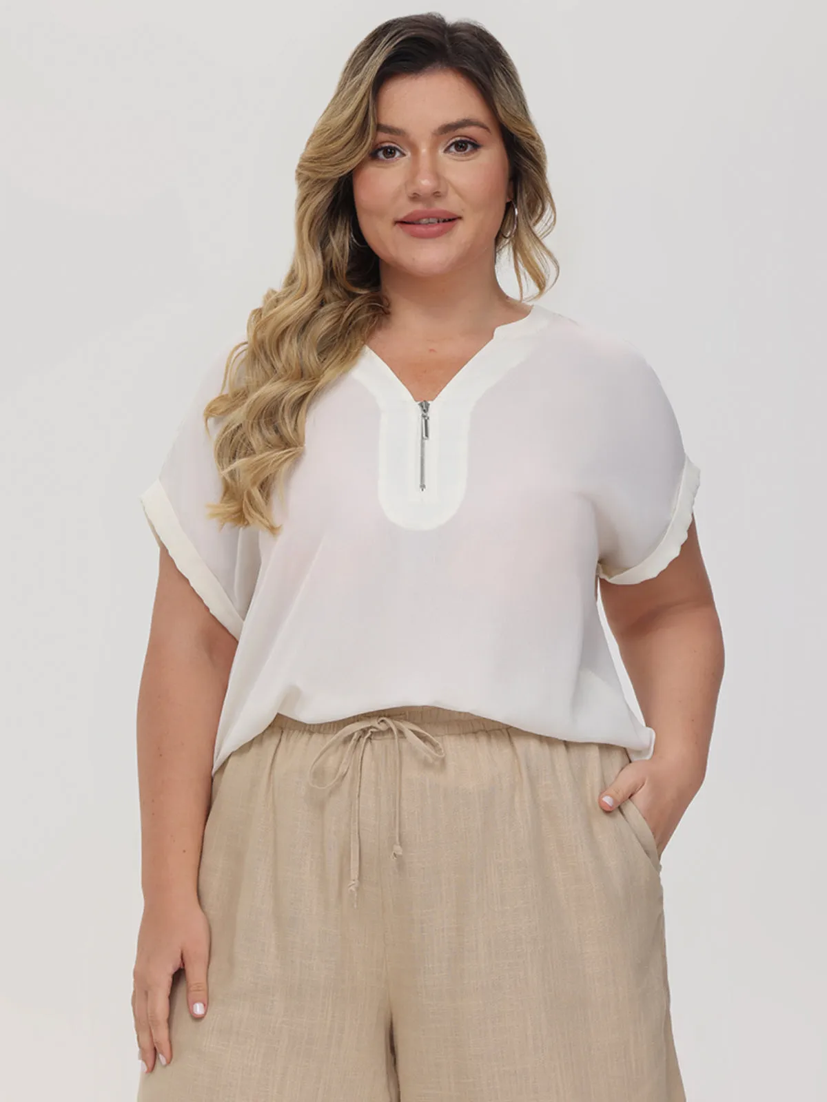 Plus Zipper Neck Blouse sold by 89th & Madison