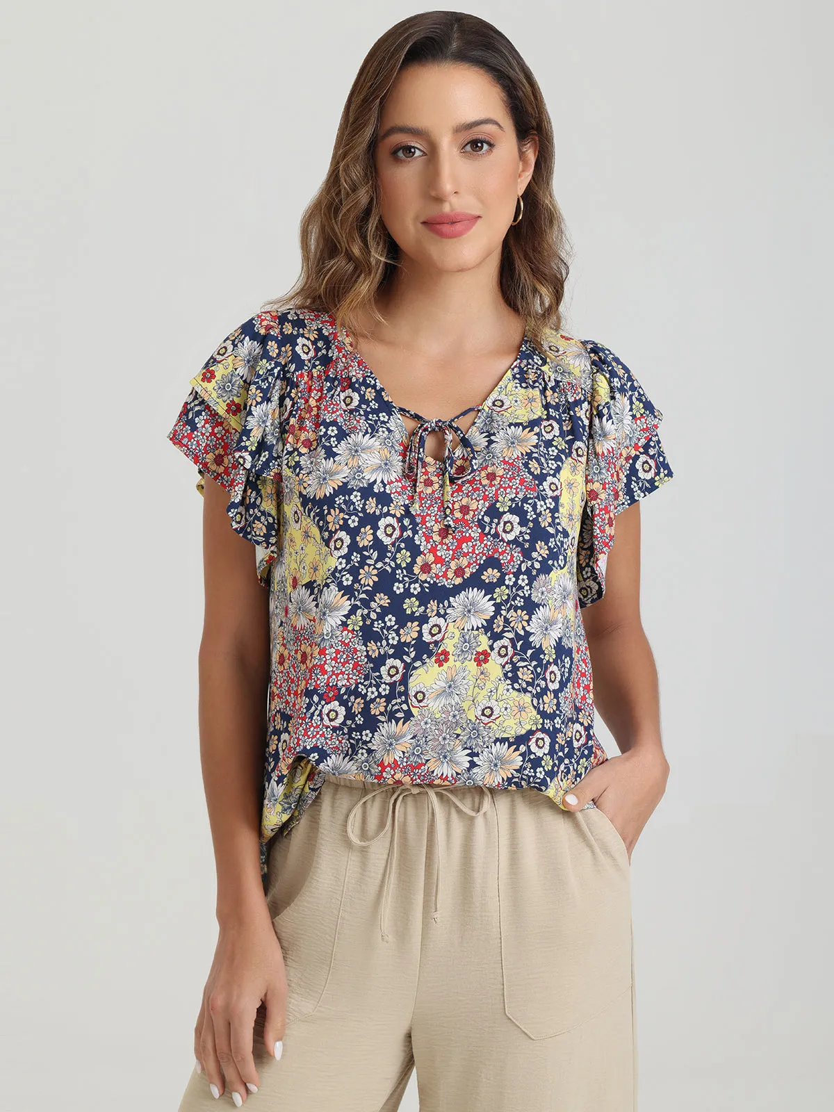 Floral Flutter Sleeve Blouse sold by 89th & Madison