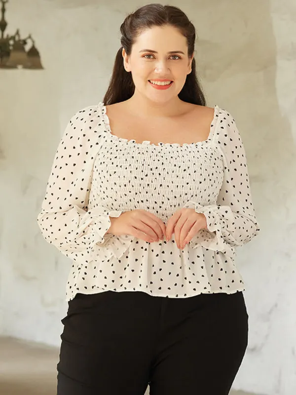 Plus Heart Print Smocked Peplum Blouse sold by 89th & Madison