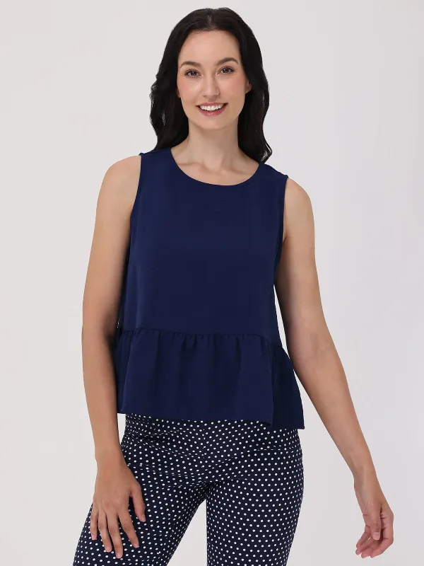 Sleveless Peplum Top sold by 89th & Madison