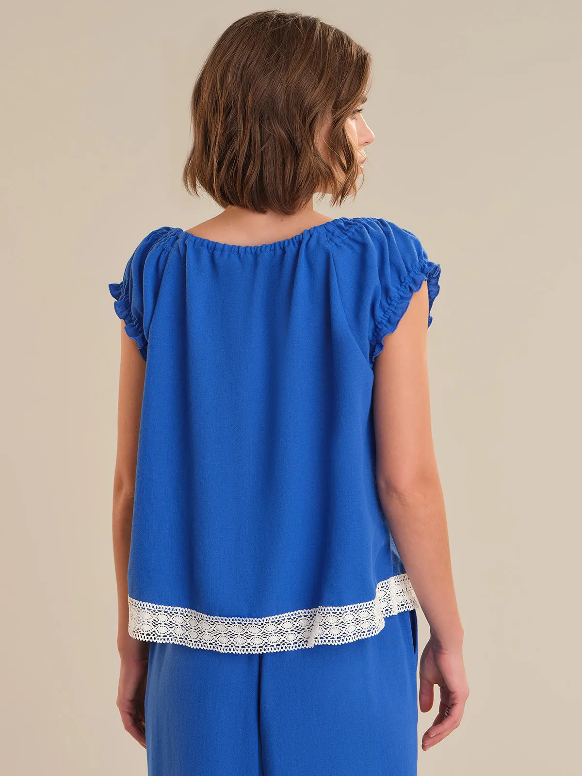 Short Sleeve Tie Front Peasant Top sold by 89th & Madison product image thumbnail 2