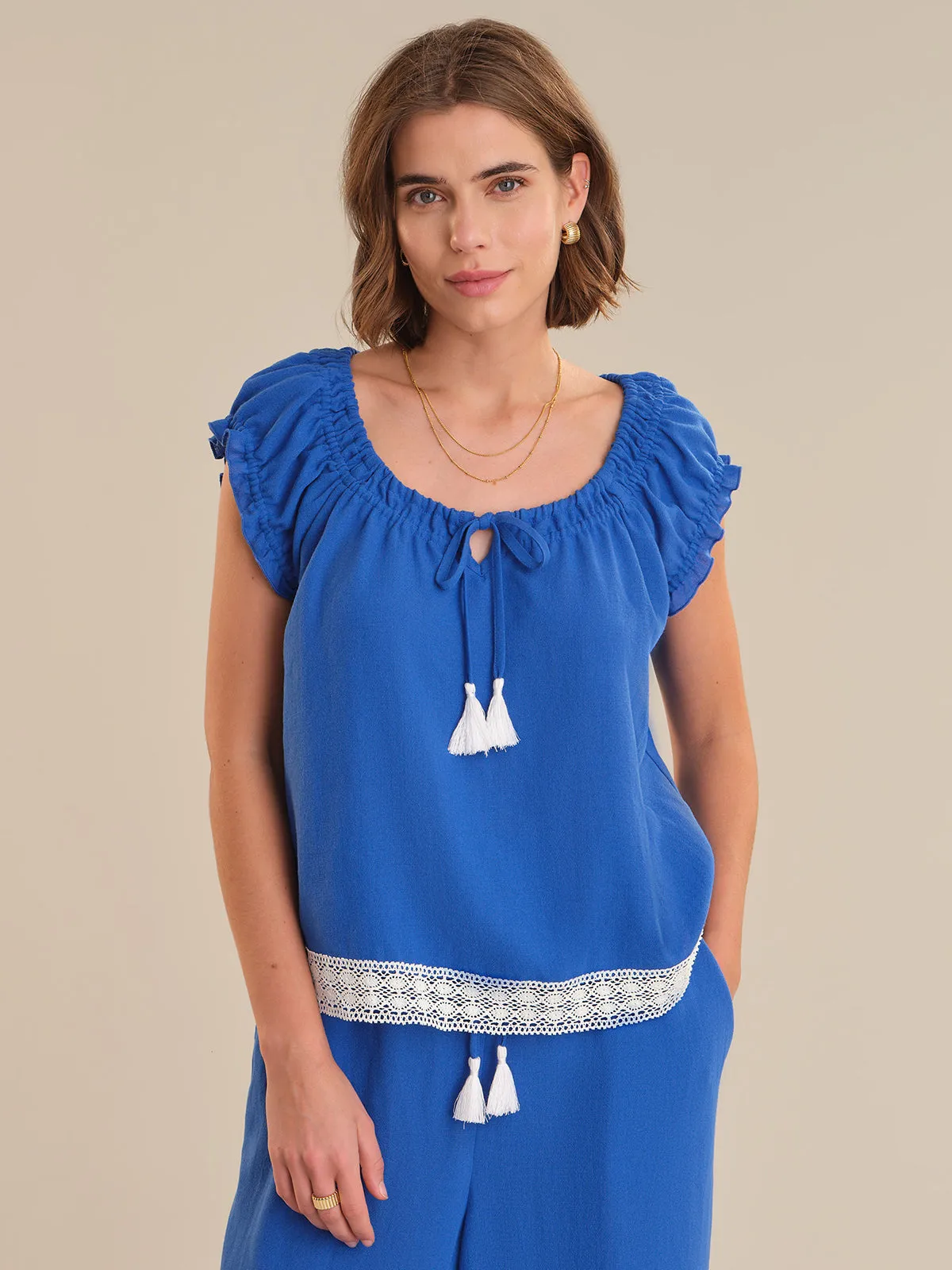Short Sleeve Tie Front Peasant Top sold by 89th & Madison