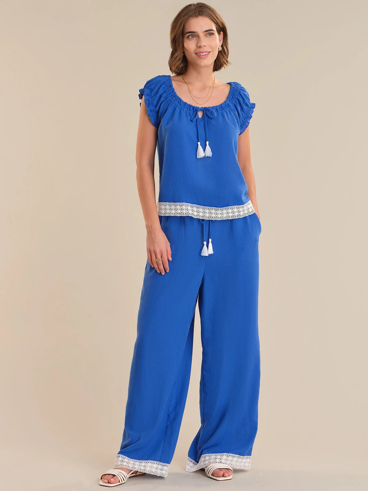 Short Sleeve Tie Front Peasant Top sold by 89th & Madison product image thumbnail 5