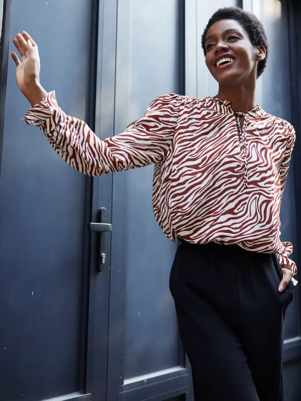 Zebra Stripe Blouse sold by 89th & Madison