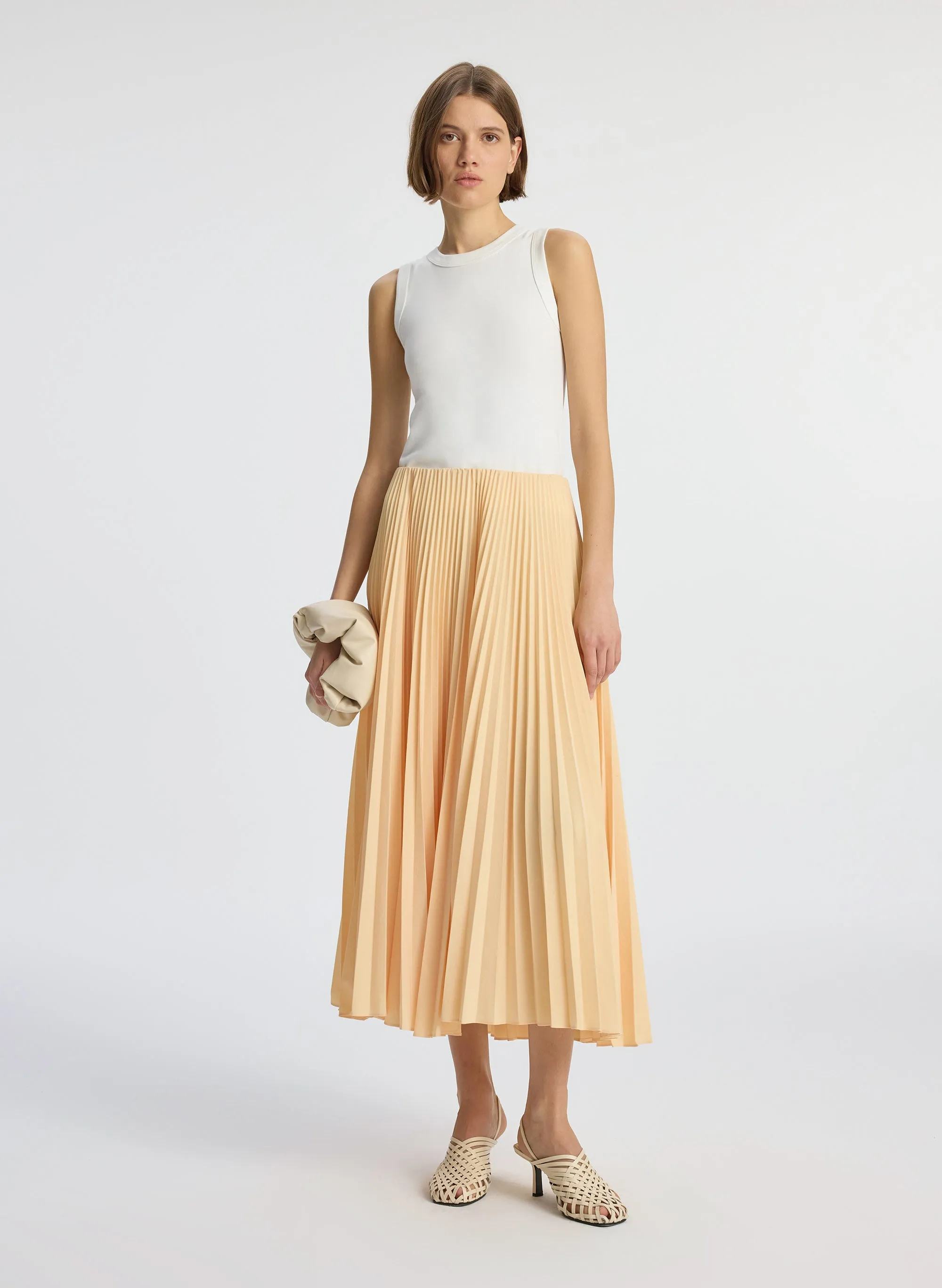 Tatum Pleated Midi Skirt sold by A.L.C.